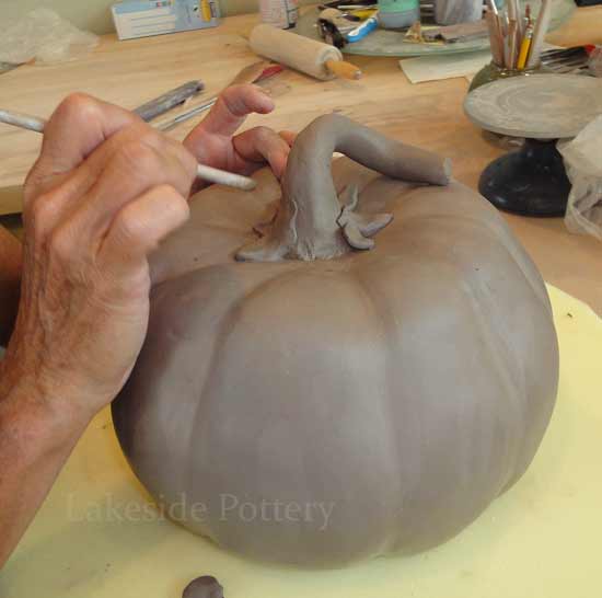 making a ceramic pumpkin
