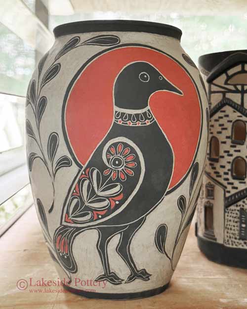 Sgraffito vase with red and black