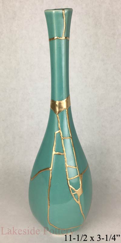 Japanese pottery sake cup with sea glass