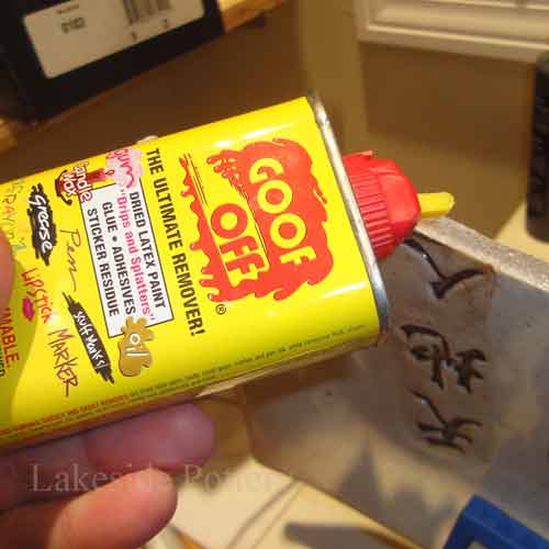 How do you remove a glue adhesive label?