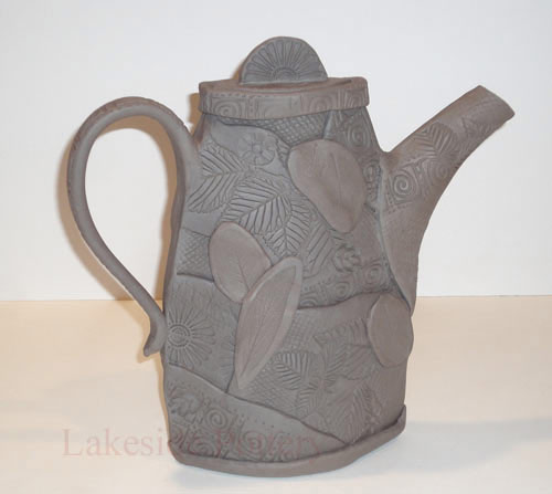 Hand built pitcher