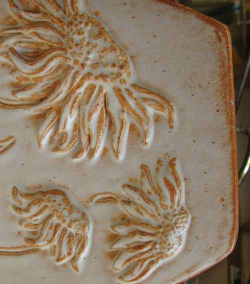 Antique White cone 6 glaze with brown breaks