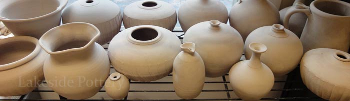 pots drying in kiln room before firing