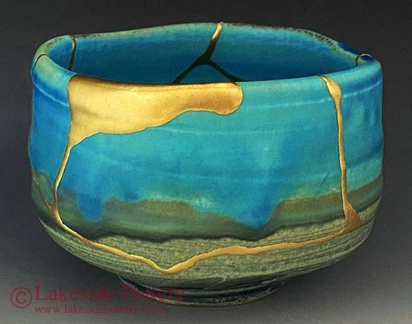 kintsugi - mending broken pottery with golden jointery