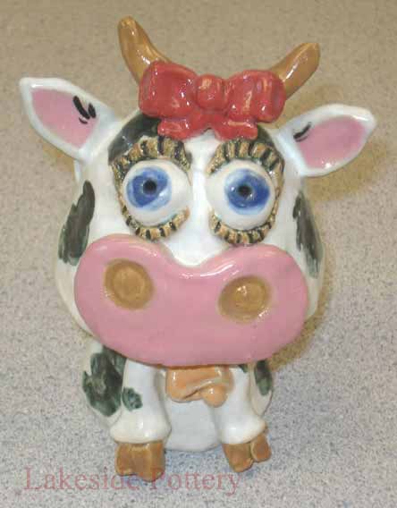 clay cow children project - bobble head