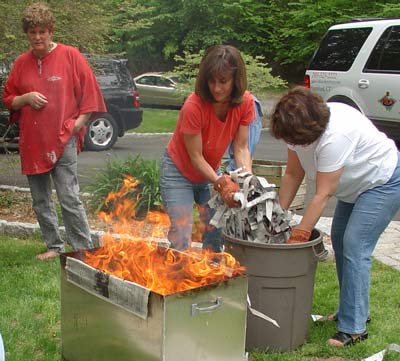 Using newspapers from raku reduction chamber