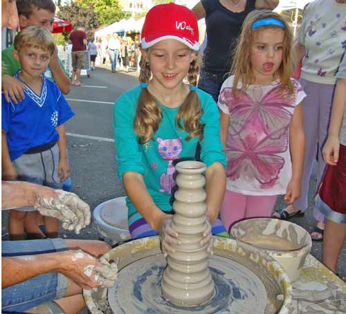 Art and Craft on Bedford Street, Stamford CT Children trying the pottery wheel