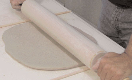 using rolling pin for clay slab