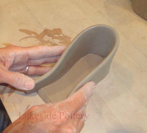joining slip and scored slab pieces of clay