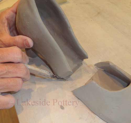 remove excess clay cuting on the bevel for joining