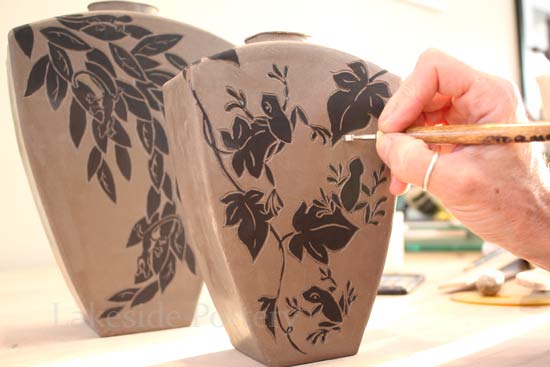 carving sgraffito on clay 