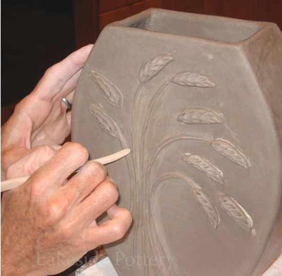 Slab vase with raied texture