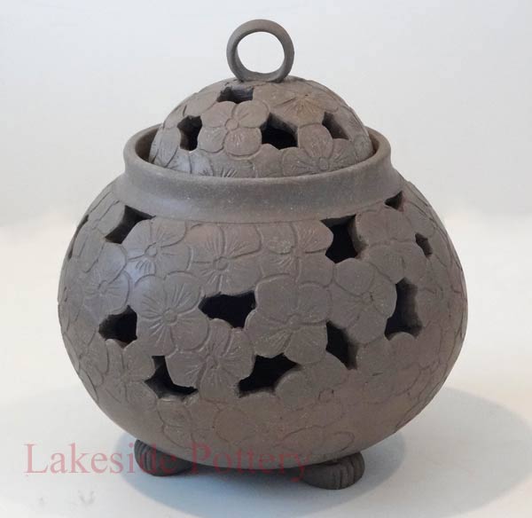 Carved incense jar with feet