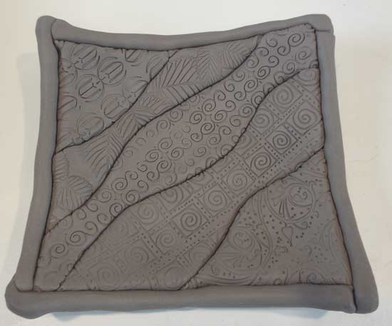 Clay quilt with surface texture pattern