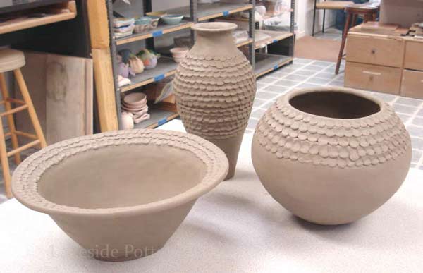 set of large coil construction clay pots