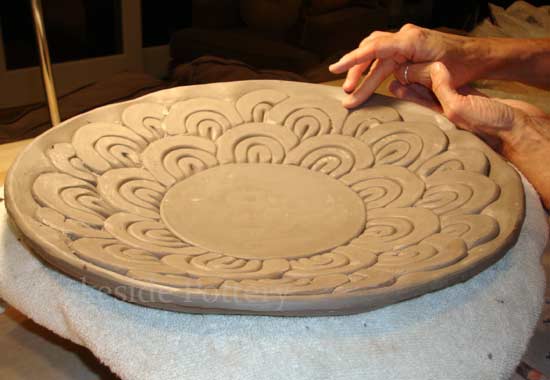 using clay coil to make a decorative bowl