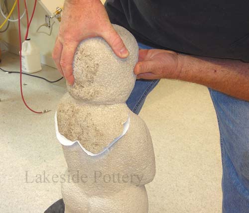 fitting head stone over base