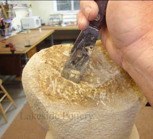 scrape old glue