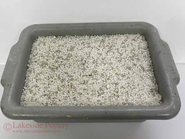 For the pellets, search web for "Resin pellets". The sharp edges type (as shown above) work better than the totally round pellets