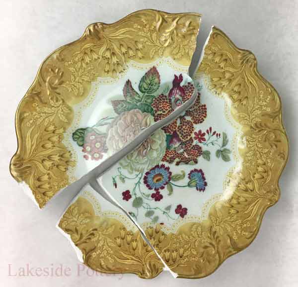 Broken Antique plate with missing segment