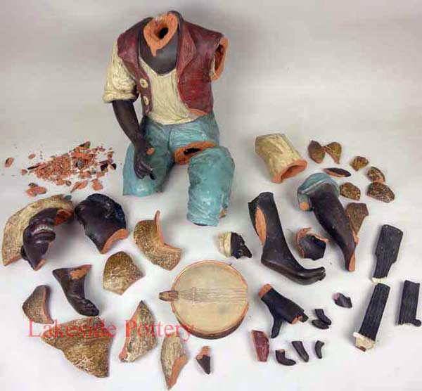 African terra cotta large statue broken to many pieces
