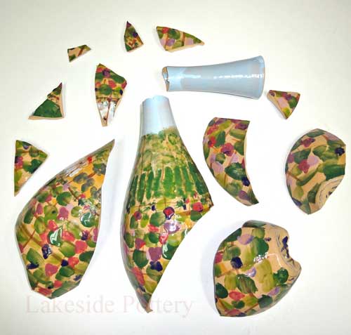 broken italian vase with many pieces