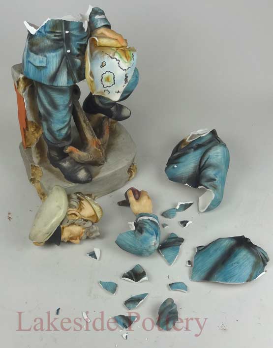 restoration of ceramic figurine - before
