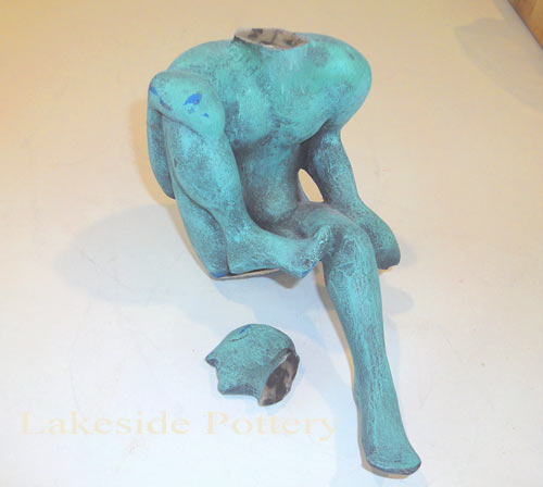 patina sculpture figure - broken