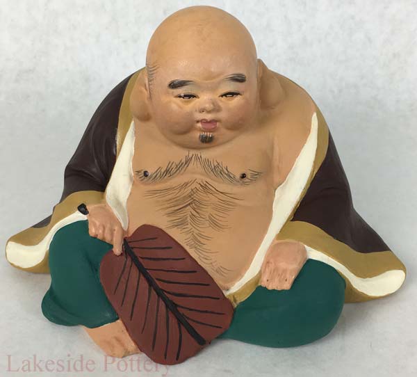 Repaired antique Japanese Buddha figurine