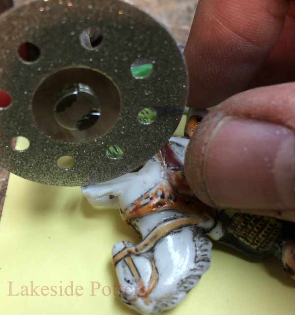 Grinding a peg slot with diamond disc