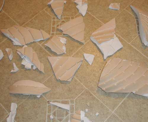 Broken plaster lamp - many pieces