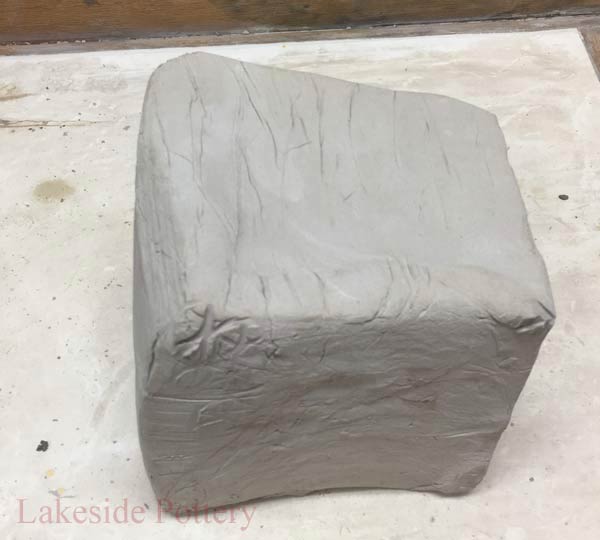 Allow the block of clay to be totally dry. The clay can be current or decades old