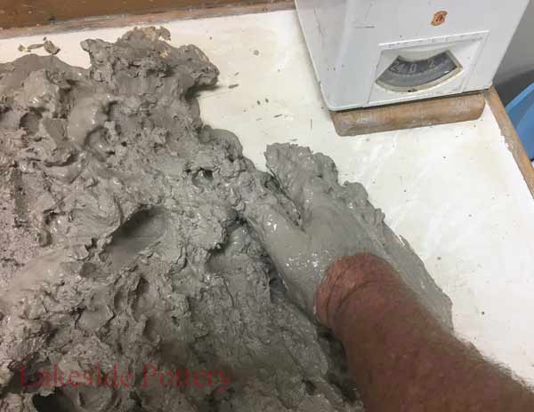 Spread the clay mix thinly and evenly to about 2 to 3 inches thick