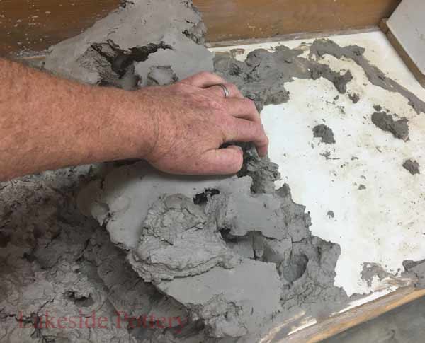When the clay can be pulled off easily, remove it from the plaster board