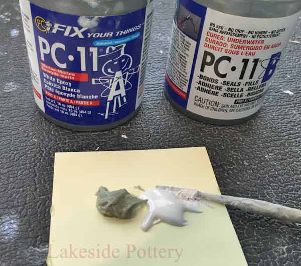Use Pc-Epoxy pc-11 epoxy filler.  Mix even parts of PC-11 epoxy filler