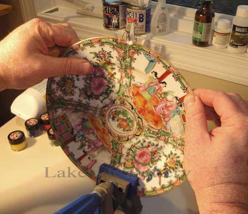 Cementing, filling, coloring and glazing broken antique plate