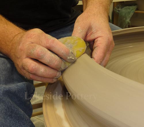 Throwing a very large platter on the wheel lesson