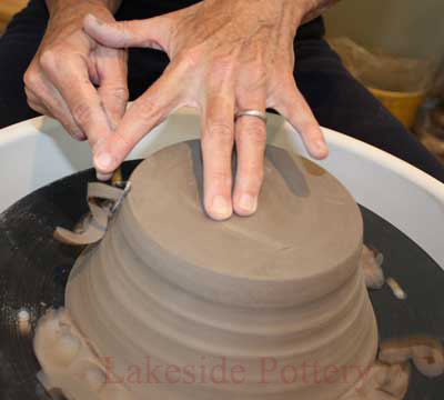 Two hands touching tightly at all times